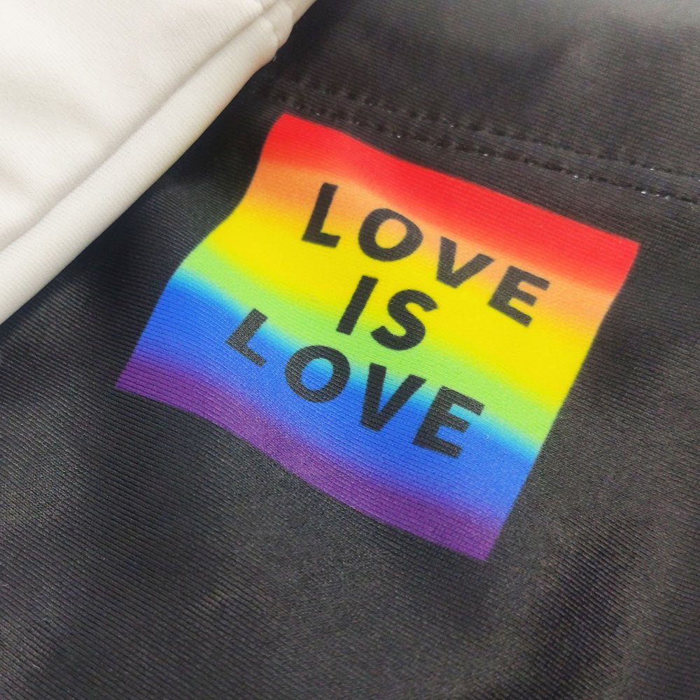 Love is Love Swim Trunks